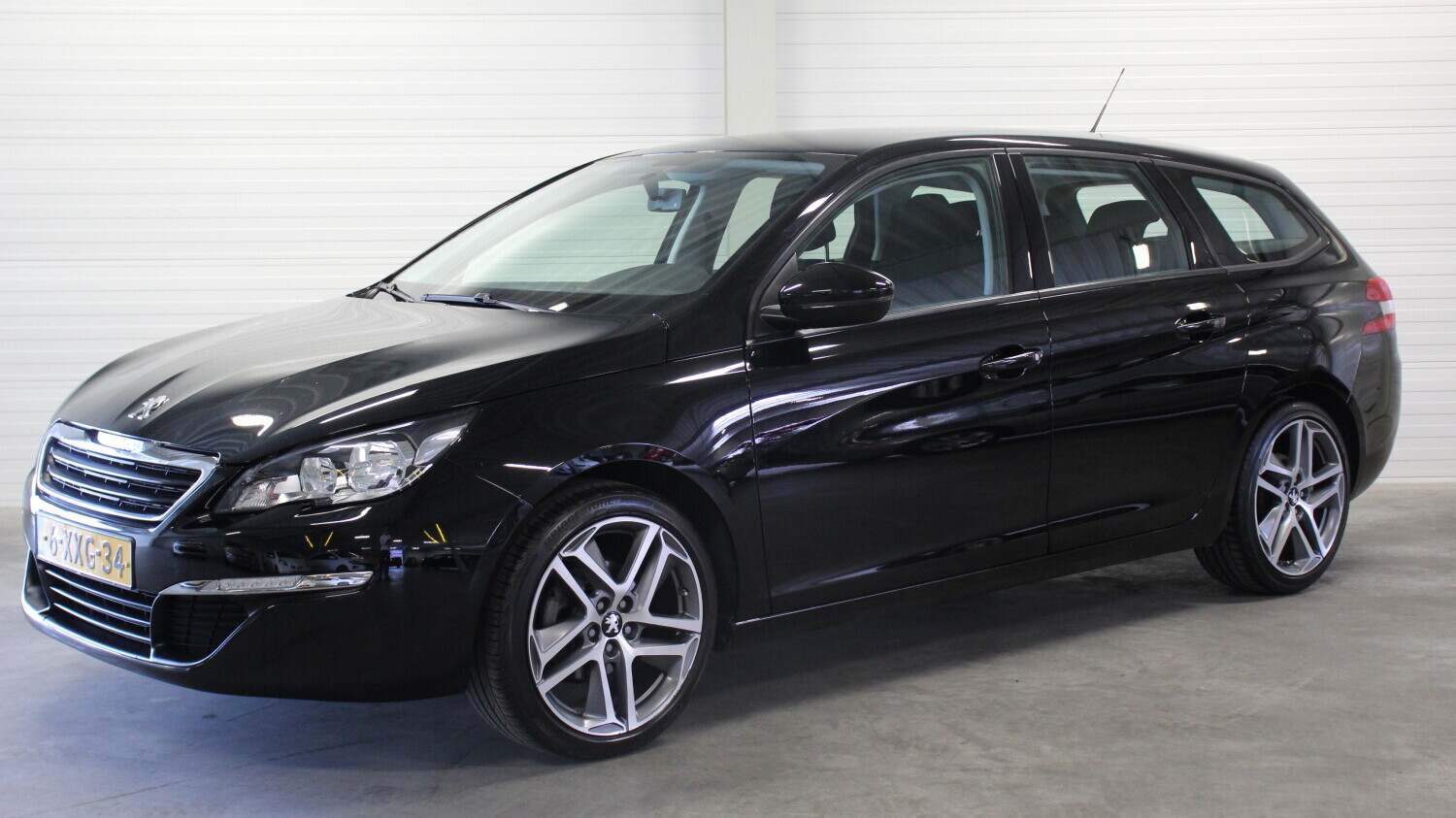 Peugeot 308 Station 2014 6-XXG-34 1